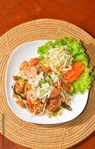 Seafood Pad Thai (Thai dish) in white dish at top view