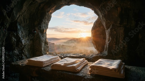 Empty tomb with bright light signifying Christ is Risen for Easter resurrection.