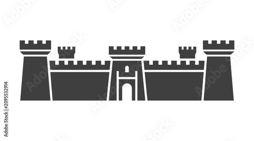 Foto Black silhouette of castle walls towers.