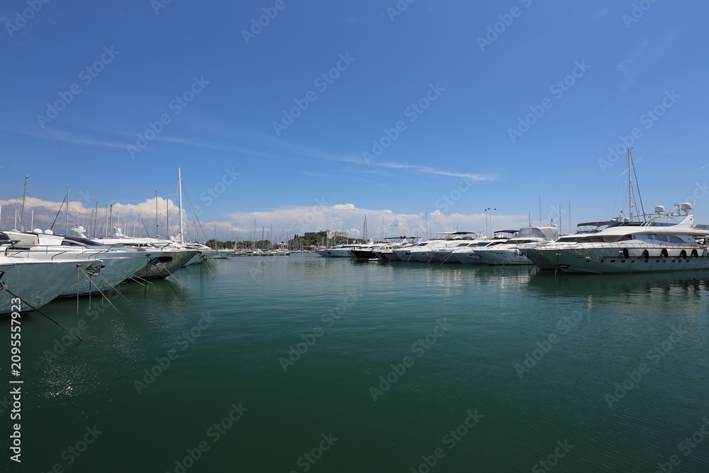 Fototapeta premium Superyachts Docked with Fort Carre in Distance, Antibes