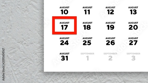 Tableau sur toile Close-up of August 17th date marked with a red cursor on a 2026 wall calendar