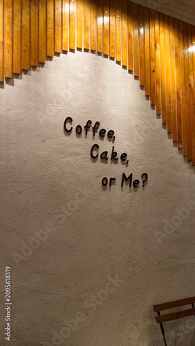 Photography Minimalist cafe wall decor with a witty quote and wooden panel accents