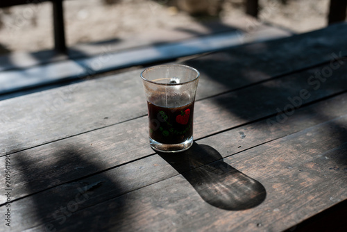 glass of beer on wooden table