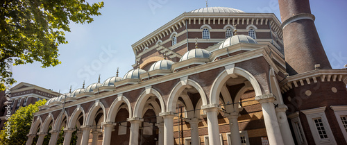 Quadro em tela Architecture exterior facade of Mosque in Dutch capital city Amsterdam, The Netherlands, with columns, dome and minaret tower