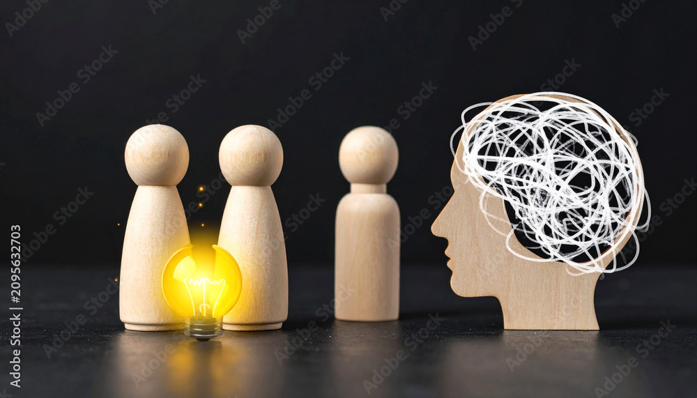Fototapeta premium Wooden Figurines with Light Bulb and Question Marks