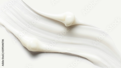 smear of cream texture on a light background