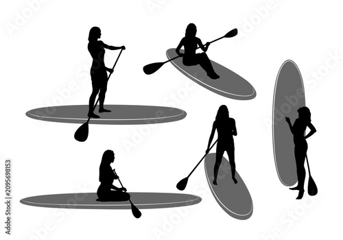 A set silhouettes of women sailing on sup boards.
