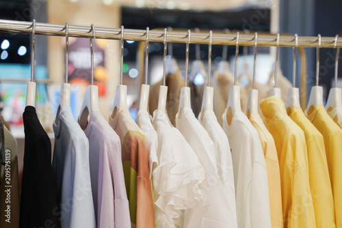 фотографія Clothing on hanger at the trendy shop boutique