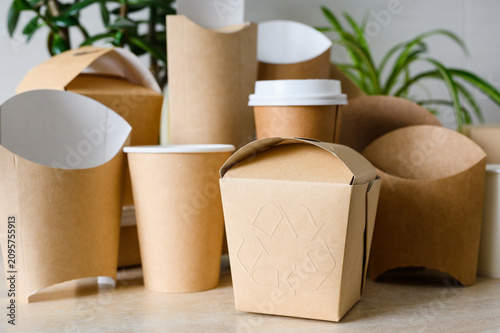 Embossed recycling sign. Eco-friendly tableware and food packaging.
