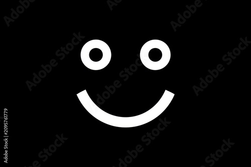 White smiley face glowing on pitch black backdrop in minimalist high contrast shot for social media marketing
