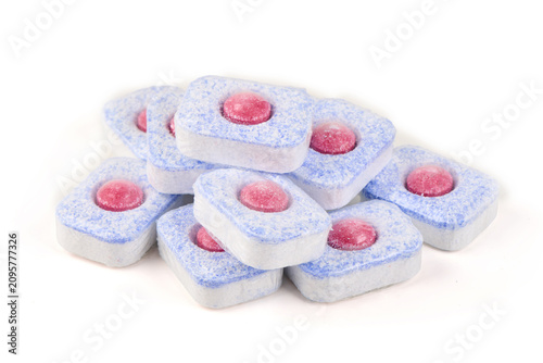 Quadro su tela Dishwasher tablets with red gel isolated on white background
