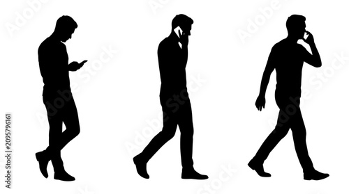 Black silhouettes depicting a man walking while using his smartphone for calls and texting