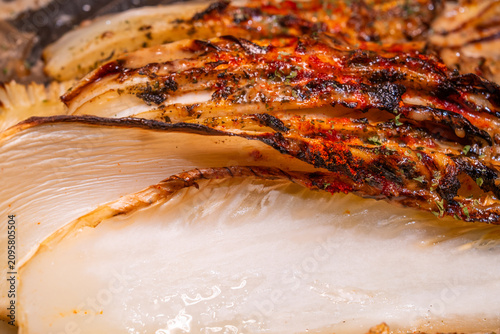 Roasted napa cabbage steak seasoned with herbs and spices