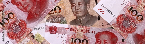 Canvas Print Chinese yuan money bills pile on table