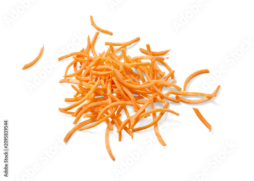 Fresh carrot strips on white background. Top view of slices carrot.