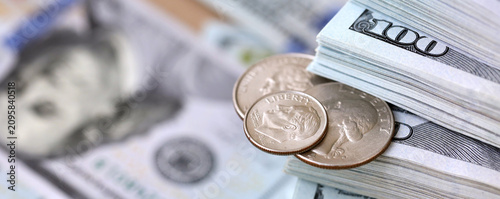 Obraz na plátně US coin lies among ten thousand dollars packs in stack on big amount of hundred