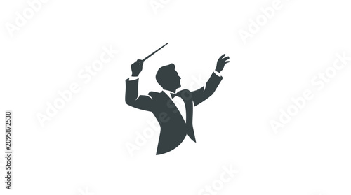 Silhouette of a male conductor leading.