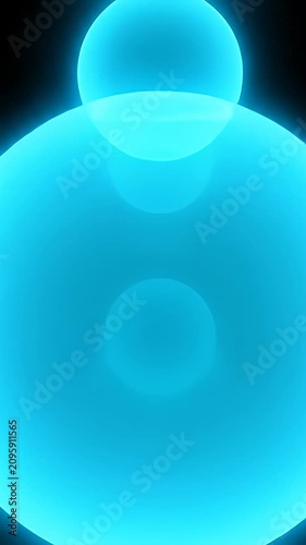 Two large blurry blue glowing circles on black.