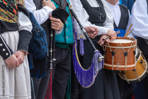 фотографія Folk group playing bagpipes and drums The Concept of tradition