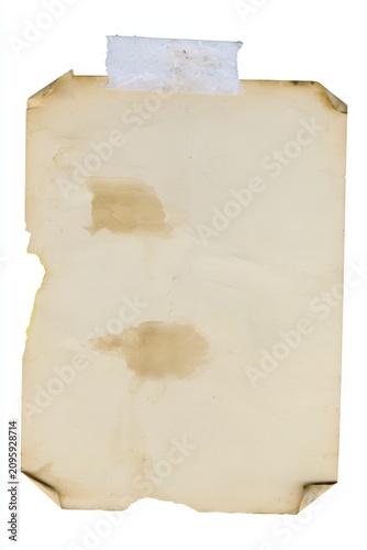 A close-up shot of a single piece of aged, yellowed paper with water stains and dog-eared corners, attached with a piece of distressed masking tape to a white background