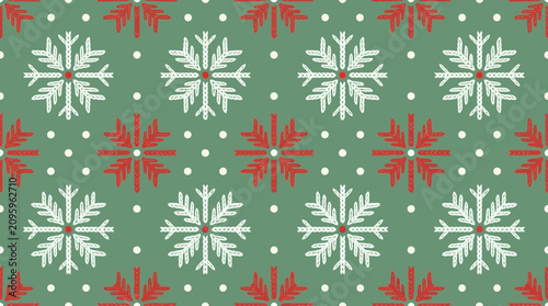 Festive seamless pattern with white and red snowflakes on green background