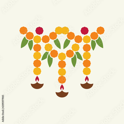 Traditional Indian marigold flower garland and diya decoration for Diwali festival