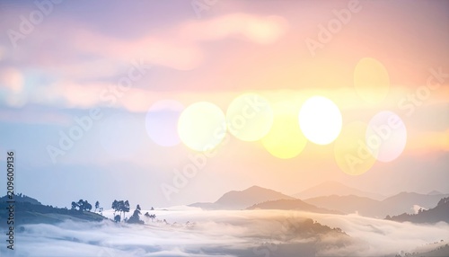 Serene Mountain Landscape at Sunrise with Fog and Bokeh Lights.