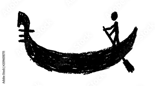 Gondola boat with gondolier rowing on water.