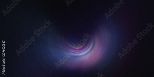 Bild auf Leinwand Abstract colorful spinning light effect on a dark background creating a hypnotic vortex