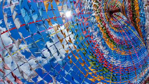 Photos Vibrant circular canopy of prayer flags, unique tourist landmark on Shangri-La p