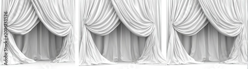Three panels of elegant white fabric curtains draped and gathered