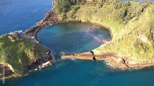 Magical island with circular lagoon Ilhéu de Vila Franca do Campo on the Azores islands in Portugal view from above