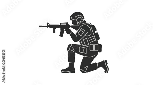 Obraz na płótnie Soldier in combat gear kneeling with rifle.