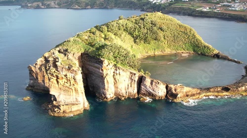 Magical island with circular lagoon on Azores islands in Portugal view from above