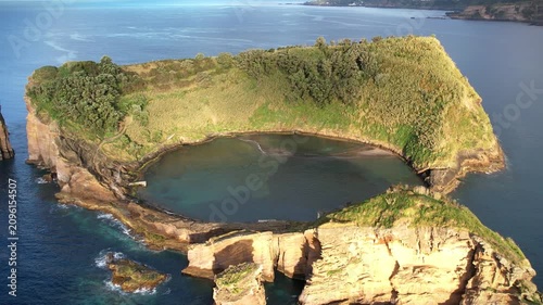 Magical island with circular lagoon on Azores islands in Portugal view from above