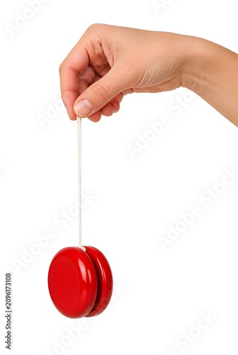 Hand holding red yo yo with string against white background