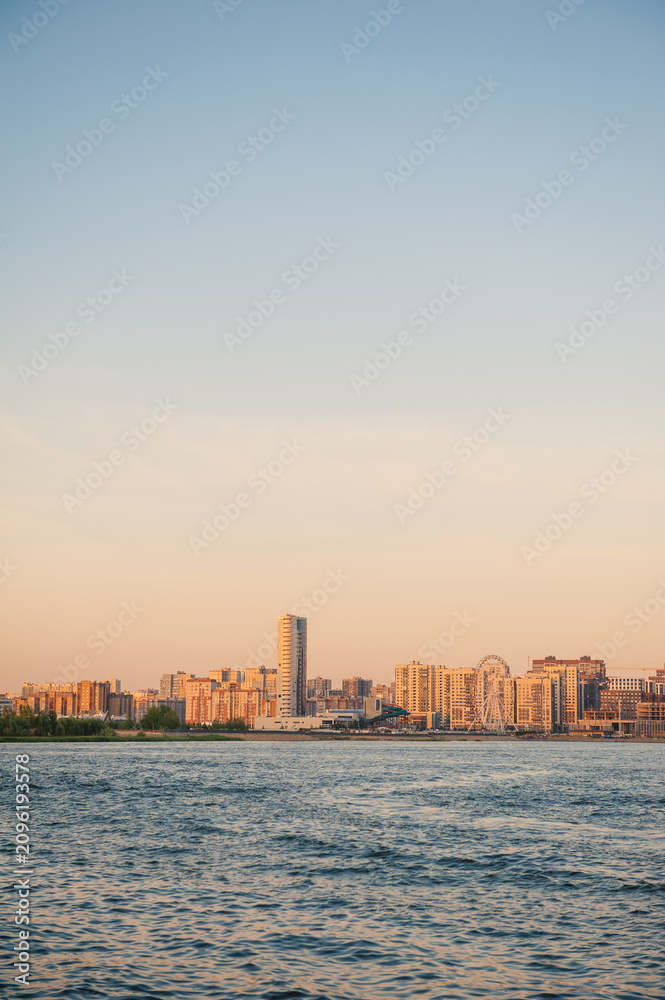 Obraz premium Modern skyline of Kazan overlooks river