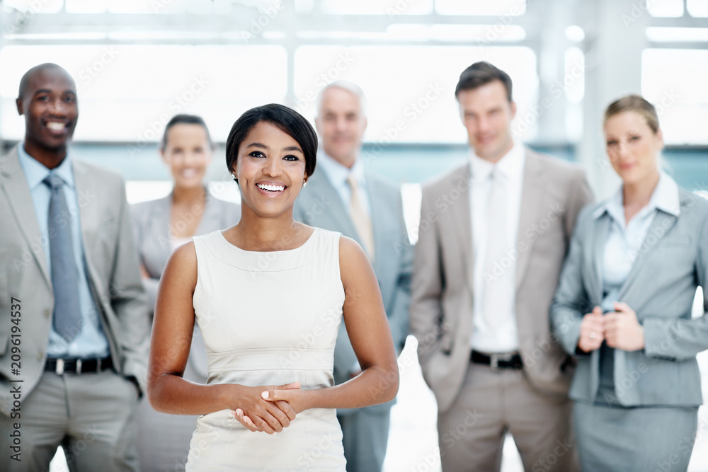 Fototapeta premium Smile, portrait or business woman with team in lobby for career, about us or financial conference. Consultant, group and proud finance advisor in office with ambition, corporate event or opportunity