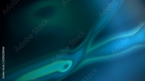 Ethereal green and blue abstract background with flowing aurora-like energy and particles
