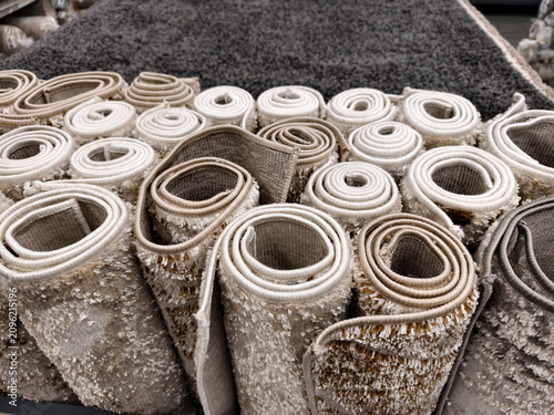 Konstfotografi Decorative shaggy carpets in warm hues laid out in a superstore offering soft te