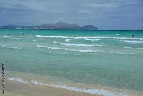 Playa de Muro beach on Mallorca island, Spain. Summer vacation in July.