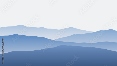 Konstfotografi Layered mountain silhouettes in varying shades of blue create a minimalist sceni