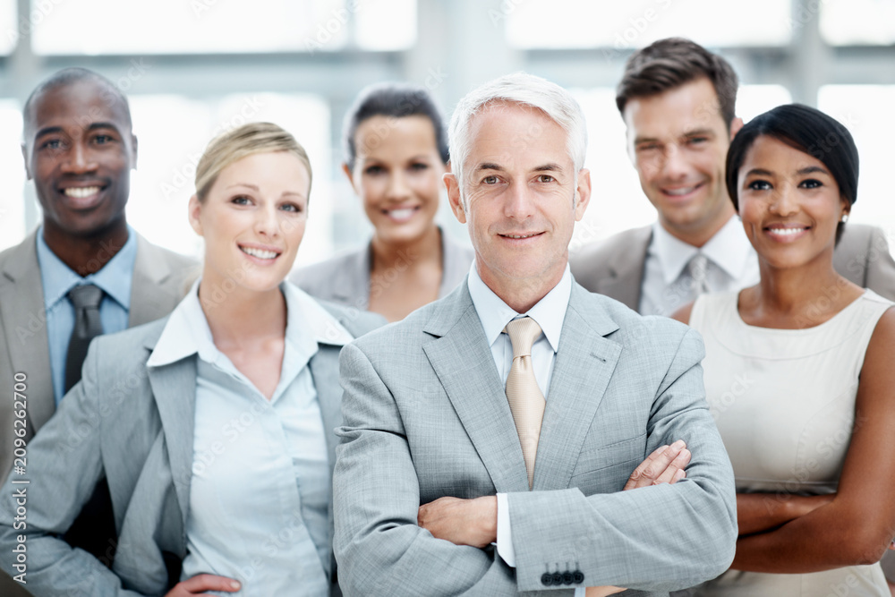 Fototapeta premium Partnership, portrait and business people with arms crossed in office, team or financial development. Corporate company, group and leader with colleagues, happy or collaboration for wealth management