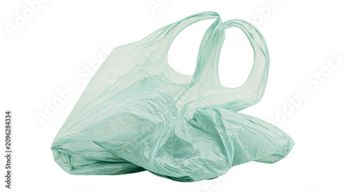 Crinkled light green plastic shopping bag with handles, isolated on transparent background