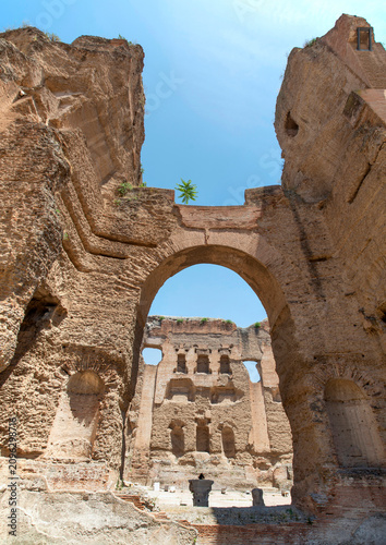 Part of the internal section with massive ancient brick walls and arches of the Baths of Caracalla in Rome, Italy