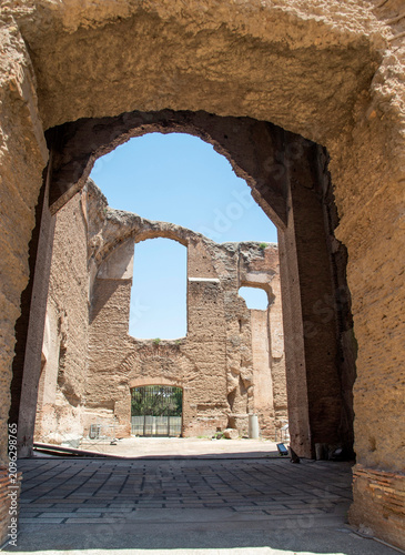 Part of the internal section with massive ancient brick walls and arches of the Baths of Caracalla in Rome, Italy