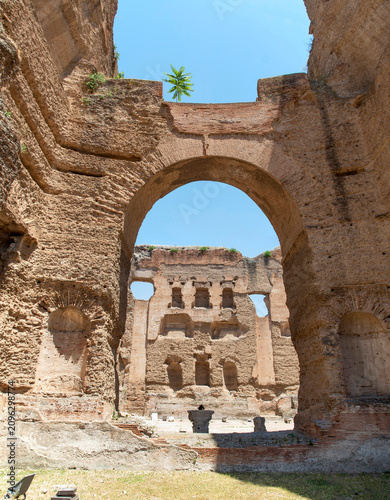 Part of the internal section with massive ancient brick walls and arches of the Baths of Caracalla in Rome, Italy