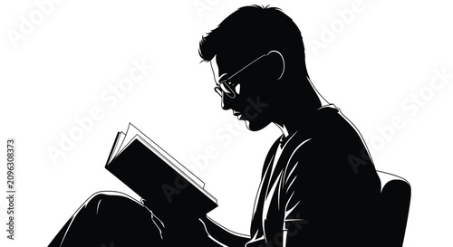 Foto Silhouette of a Person Reading a Book in Profile.