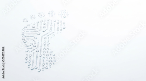 Water droplets forming digital footprint on white background symbolizing technology and innovation