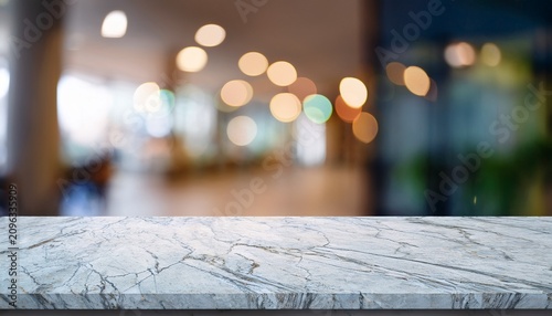 marble stone tabletop and blurred bokeh office interior space background can used for display or montage your products